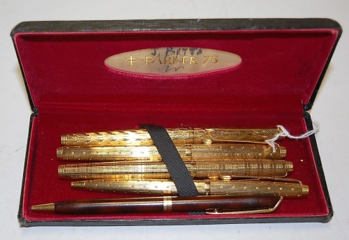 Lot 474 - A Parker gilt metal cased fountain pen having...