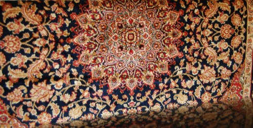 Lot 1157 - A Keshan woollen rug 190 x 140cm