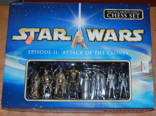Lot 1677 - A Star Wars pewter and bronze effect chess set...