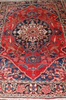 Lot 1521 - A Persian woollen Bakhtiari rug, having a red...