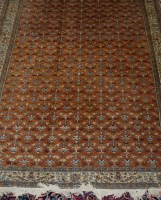 Lot 1525 - A Persian woollen Kaysari carpet, the brown...