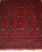 Lot 1526 - A Persian woollen fineweave Bokhara rug, the...