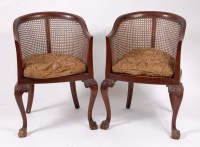 Lot 1536 - A pair of circa 1900 mahogany Bergère chairs,...