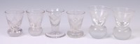 Lot 1109 - Four various 19th century firing glasses and...