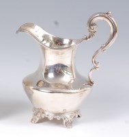 Lot 1126 - A William IV silver cream jug, having flying S-...