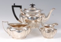 Lot 1155 - An Edwardian silver three piece teaset,...