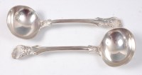 Lot 1173 - A pair of late Victorian silver sauce ladles,...