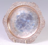 Lot 1178 - An Irish silver coaster, having Celtic...