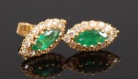 Lot 1218 - A pair of 18ct gold, emerald and diamond set...