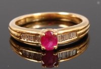 Lot 1225 - An 18ct gold, ruby and diamond dress ring,...