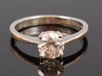 Lot 1226 - An 18ct white gold diamond solitaire ring, the...