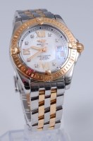 Lot 1236 - A Breitling ladies steel and 18ct gold...