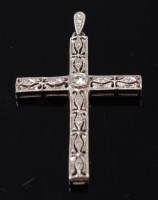 Lot 1269 - A white gold and diamond set cross pendant,...