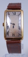 Lot 1283 - A vintage gents 18ct gold P.W.C. tank watch,...