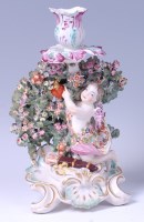 Lot 1086 - An 18th century Derby porcelain candle-holder,...