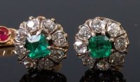 Lot 1296 - A pair of yellow metal, emerald and diamond...