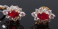 Lot 1298 - A pair of yellow metal, ruby and diamond set...