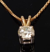 Lot 1315 - A diamond pendant on finelink neck chain, the...