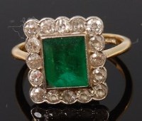 Lot 1318 - An Art Deco 18ct gold, emerald and diamond...