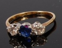 Lot 1322 - An 18ct gold, diamond and sapphire three stone...