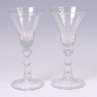 Lot 1114 - A pair of George III pedestal wine glasses,...