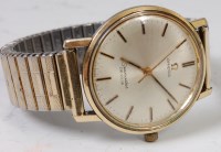 Lot 1334 - A gents Omega gold plated and steel cased...