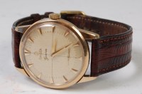 Lot 1335 - A 1950s Omega 9ct gold cased gents wristwatch,...