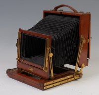 Lot 1353 - A circa 1900 mahogany and brass mounted...