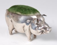 Lot 1132 - An Edwardian silver pin cushion in the form of...