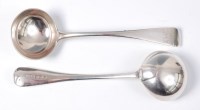 Lot 1144 - A pair of late Victorian silver sauce ladles,...