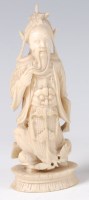 Lot 1387 - A 19th century Chinese carved ivory figure of...