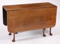 Lot 1538 - A George III mahogany dropleaf table, the...