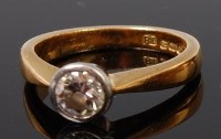 Lot 1341 - An 18ct gold diamond solitaire ring, the...