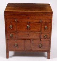 Lot 1573 - A George III mahogany washstand, the hinged...