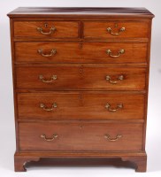 Lot 1579 - A large George III mahogany chest, having two...