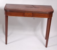 Lot 1588 - A George III mahogany tea table, the D-shaped...