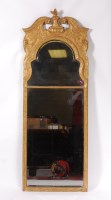 Lot 1598 - A George II giltwood and gesso pier glass, the...