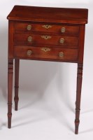 Lot 1543 - An early 19th century mahogany work table,...