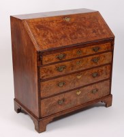 Lot 1594 - A George II figured walnut and walnut writing...