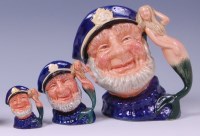Lot 56 - A trio of graduated Royal Doulton character...