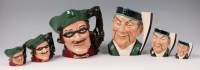 Lot 64 - A trio of graduated Royal Doulton character...