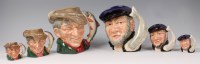 Lot 76 - A trio of graduated Royal Doulton character...