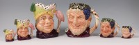 Lot 77 - A trio of graduated Royal Doulton character...