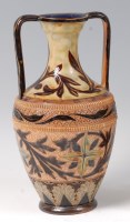 Lot 112 - A Doulton Lambeth twin handled stoneware vase...