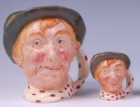 Lot 55 - Two Royal Doulton character jugs; one large...