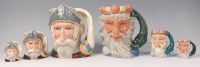 Lot 70 - A trio of graduated Royal Doulton character...