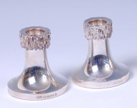 Lot 208 - A pair of contemporary silver squat...