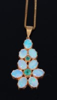 Lot 220 - A contemporary 9ct gold cabochon opal and...