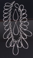 Lot 231 - A contemporary silver necklace, of graduated...