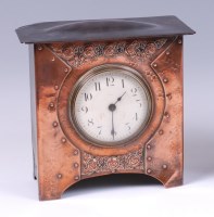 Lot 237 - An Arts & Crafts copper mantel clock, having...